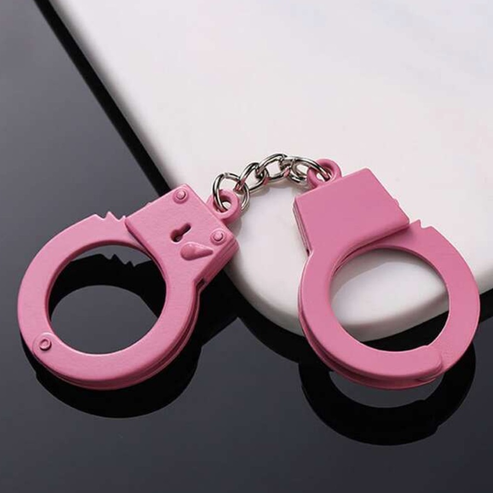 Mini pink handcuffs. New.
